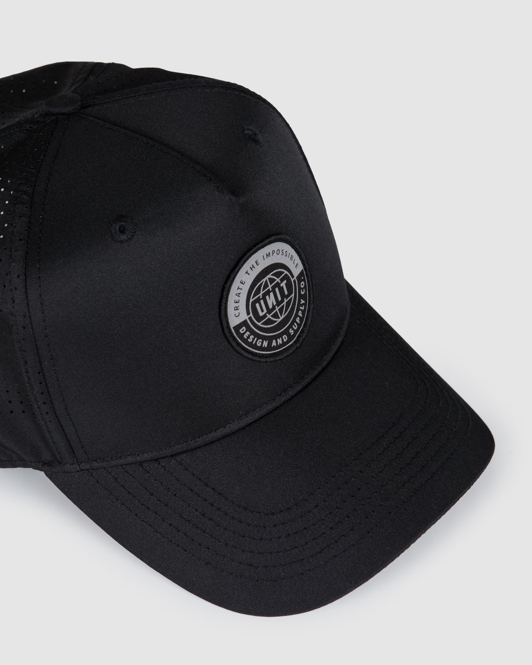 UNIT Evolve Men's Curve Peak Athletic Trucker Cap